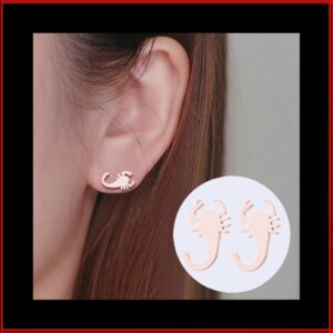 Clous d'oreilles acier doré scorpion