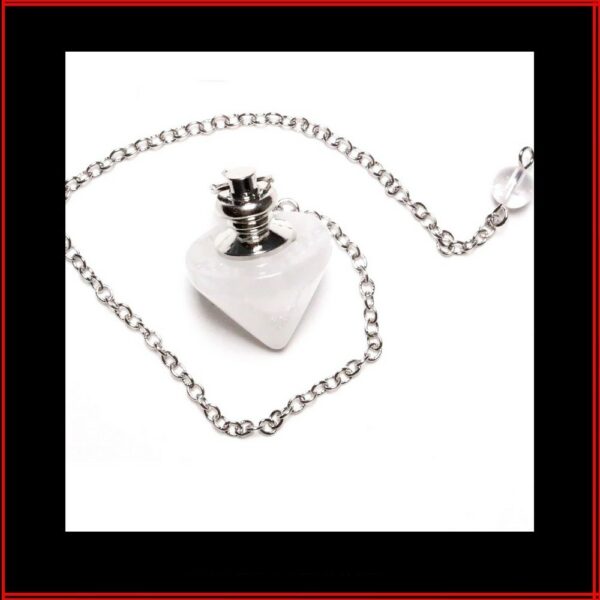 Pendule toupie cristal de roche chainette laiton argent